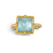 A square-cut light blue aquamarine ring set in an 18k gold bezel, shown on a plain white background.