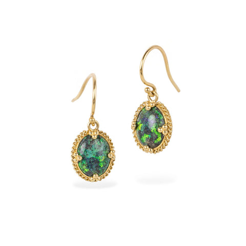 Gold earrings with green australian opal gemstones on a white background