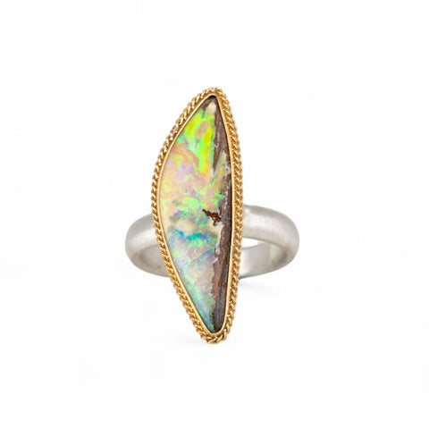 Handmade boulder opal ring with 18k gold bezel and sterling silver band
