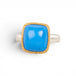 Gold and silver ring with blue ceruleite stone on white background