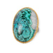 A gold and silver ring featuring a chrysocolla in quartz gemstone, shown against a white background