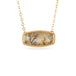 Gold necklace featuring a dendritic quartz stone against a white background.
