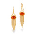 A pair of gold drop earrings featuring oval fire opal gemstones in a textured bezel setting, with gold chain fringe hanging below, shown on a clean white background.