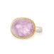 A gold and silver ring featuring a pink kunzite stone, shown against a white background