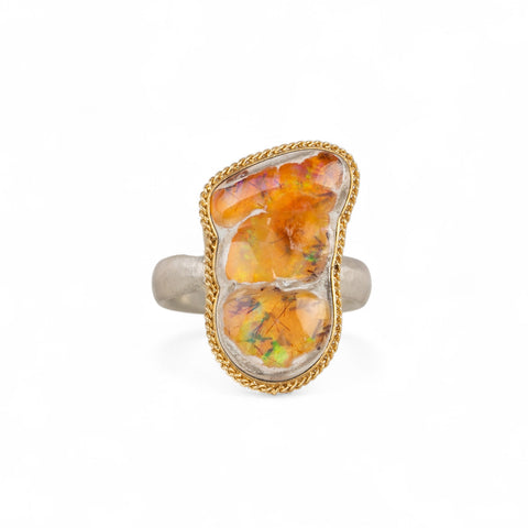 Handcrafted one-of-a-kind ring with a mexican opal gemstone, 18k gold bezel and sterling silver band