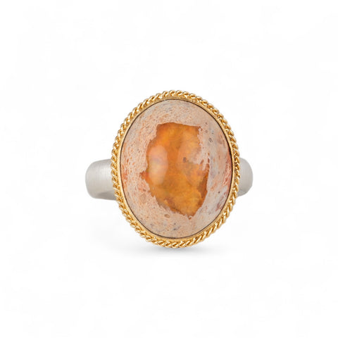 Mexican opal ring set with a handcrafted 18k gold bezel and sterling silver band