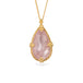 Teardrop-shaped morganite necklace set in an 18k gold bezel and matching chain, against a white background