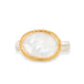 Gold and silver ring with a mother of pearl on a white background