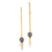 A pair of gold drop earrings with teardrop-shaped Sapphire gemstones and dangling chain details, shown on a plain white background.