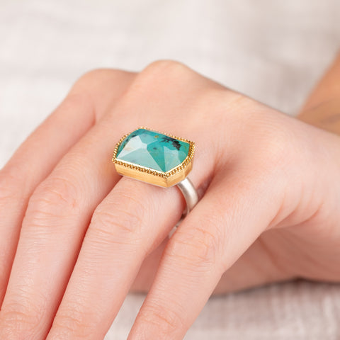 Peruvian opal ring with gold bezel and silver band