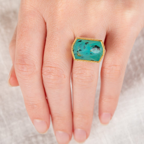 Peruvian opal ring with gold bezel and silver band