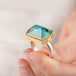 Peruvian opal ring with gold bezel and silver band