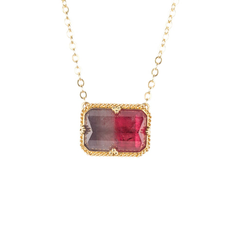 Necklace with a watermelon tourmaline gemstone pendant on a white background