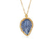 Necklace with a blue leaf-shaped tanzanite and gold setting on a white background