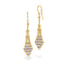 Handcrafted gold earrings with tanzanite stones on a white background