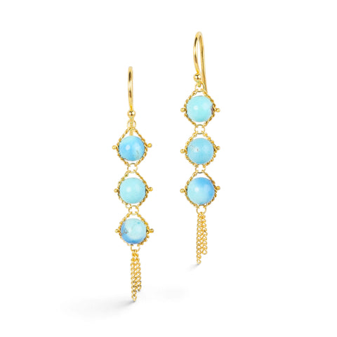 Gold earrings featuring a trio of golden hills turquoise stones, against a white background.