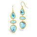 A pair of gold drop earrings featuring three stacked turquoise stones in various shapes, set in twisted gold bezel settings, shown on a white background.
