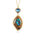 Gold Necklace featuring yowah nut opal and moonstone gemstones against a white background.