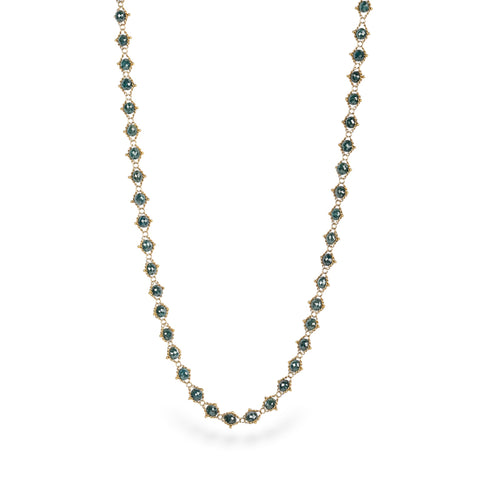Necklace with blue diamonds on a white background