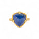 Gold ring with a tanzanite gemstone on a white background