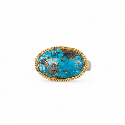 Turquoise fine jewelry ring with 18k gold bezel and sterling silver band