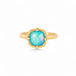 Gold ring with an Ethiopian opal stone on a white background