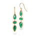 Gold earrings with emerald gemstones on a white background