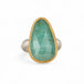 Ring featuring an emerald gemstone set in an 18k gold bezel with a silver band 