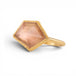 Gold ring with an Oregon sunstone hexagonal stone on a white 