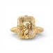 Gold ring with a rectangular dendritic quartz stone on a white background