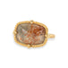 Gold ring with sunstone gemstone on a white background