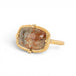 Gold ring with sunstone gemstone on a white background