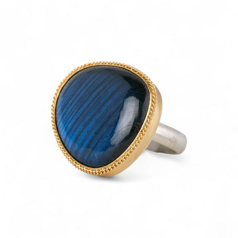 Ring with labradorite stone set in a gold  bezel with a silver band