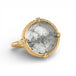 Ring with gold band and gray topaz stone on a white background