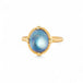 Gold ring with a moonstone gemstone on a white background