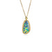 Handcrafted Australian opal and gold necklace against a white background