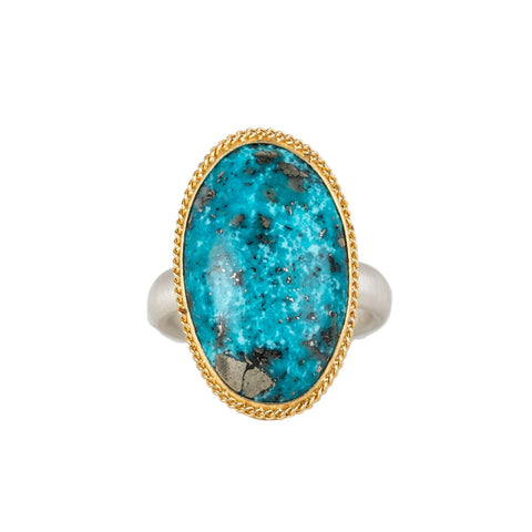 Handmade turquoise ring with gold bezel and sterling silver band