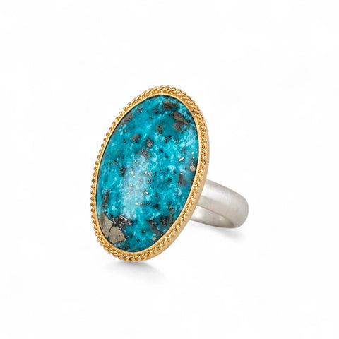 Handmade turquoise ring with gold bezel and sterling silver band