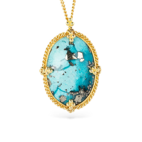 Turquoise pendant with gold frame on a white background