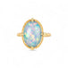 Gold ring with an Ethiopian opal stone on a white background