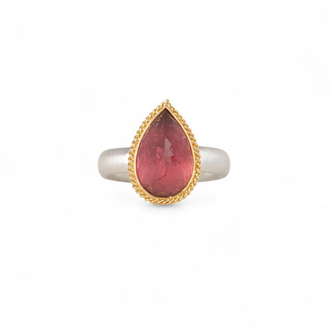 Pink tourmaline ring with gold bezel and silver band