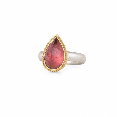 Pink tourmaline ring with gold bezel and silver band