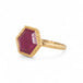 Gold ring with a hexagonal ruby gemstone on a white background