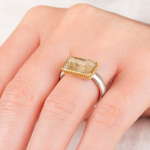 Handmade ring with rutilated quartz and 18k gold bezel and sterling silver band