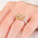 Handmade ring with rutilated quartz and 18k gold bezel and sterling silver band