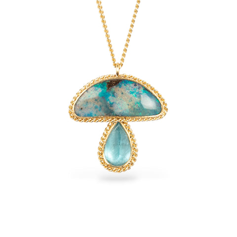 Gold necklace with mushroom pendant featuring boulder opal and aquamarine stones on a white background