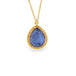 Gold necklace with a blue teardrop tanzanite on a white background