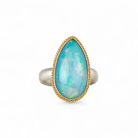 Ethiopian opal ring with 18k gold bezel and sterling silver band