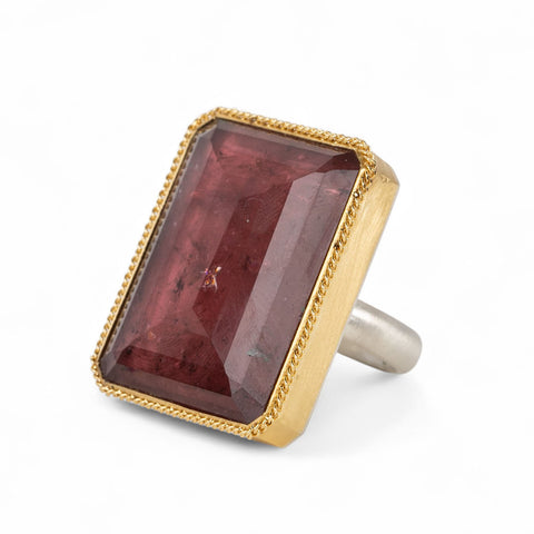 Handcrafted mixed metals ring with a tourmaline gemstone, 18k gold bezel and sterling silver band
