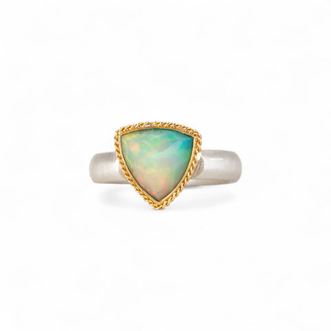 Ethiopian opal ring with 18k gold bezel and sterling silver band